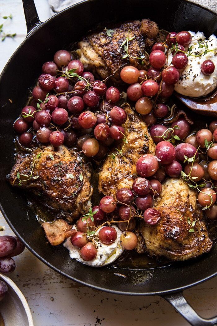 Thyme Roasted Chicken with Grapes and Burrata | halfbakedharvest.com #roastedchicken #easyrecipes #fall #autumn #skilletrecipes close up photo of Thyme Roasted Chicken with Grapes and Burrata