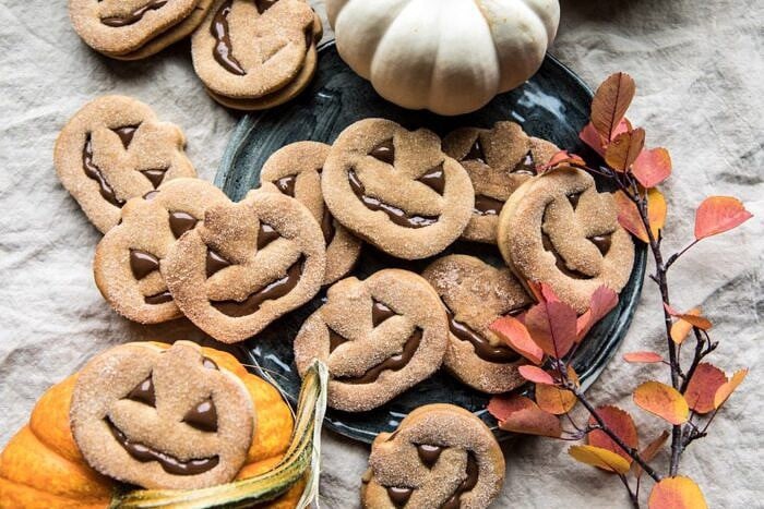 horizontal photo of Milk Chocolate Stuffed Jack-O'-Lantern Cookies 