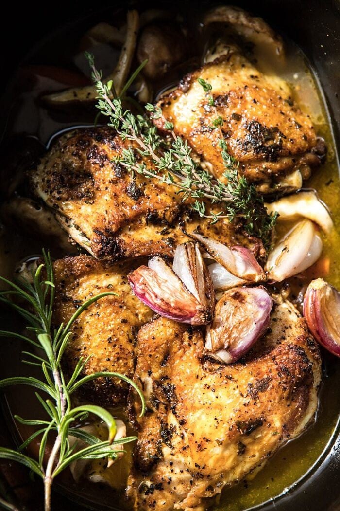 overhead photo of Slow Cooker Herbed Chicken and Rice Pilaf in slow cooker before cooking