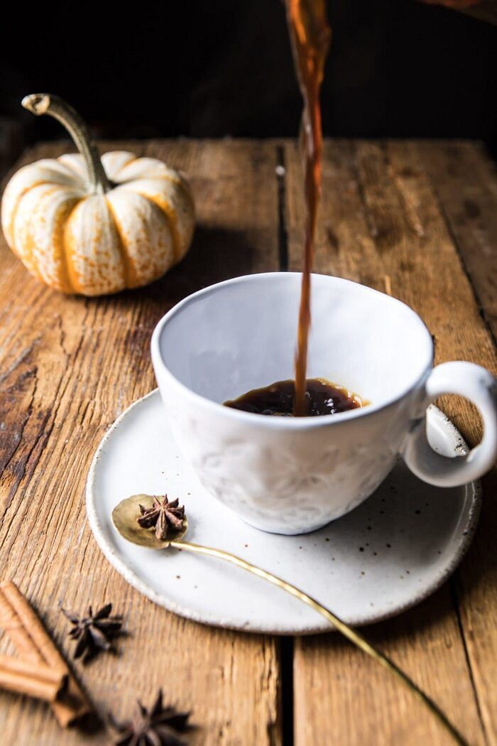Spiced Pumpkin Maple Latte | halfbakedharvest.com #pumpkinspice #pumpkin #latte #fall #autumn #healthy coffee being poured into mug