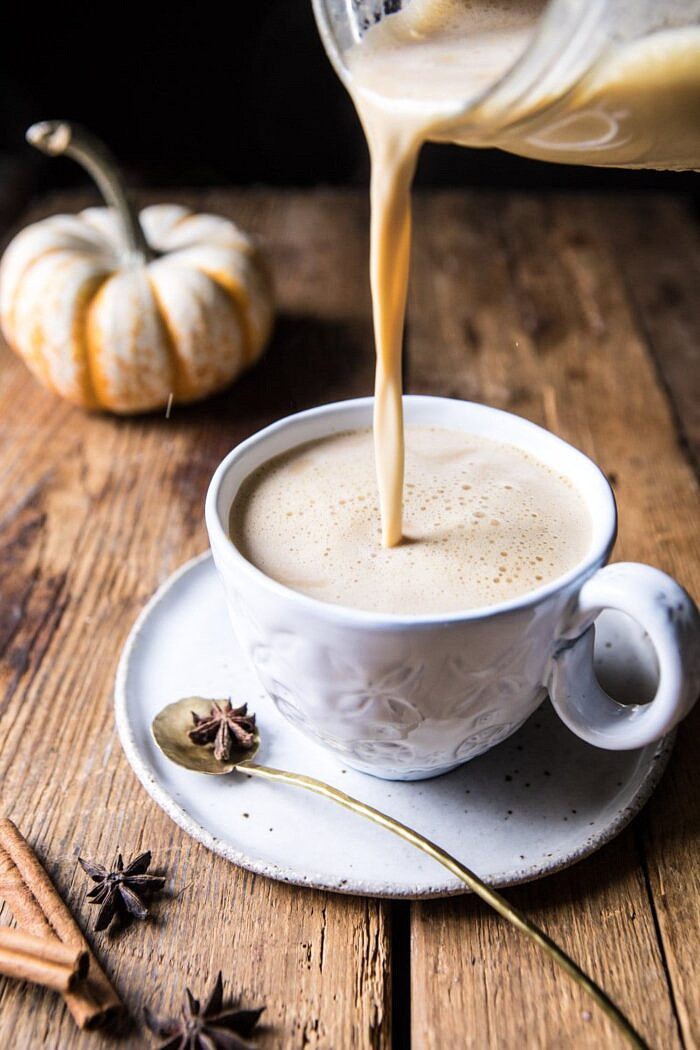 Spiced Pumpkin Maple Latte | halfbakedharvest.com #pumpkinspice #pumpkin #latte #fall #autumn #healthy pumpkin milk being poured into mug