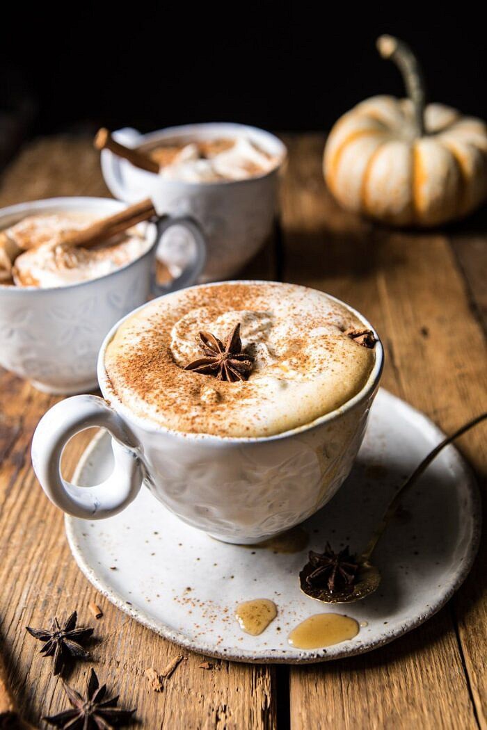 Spiced Pumpkin Maple Latte | halfbakedharvest.com #pumpkinspice #pumpkin #latte #fall #autumn #healthy front on photo of Spiced Pumpkin Maple Latte with 3 mugs in photo