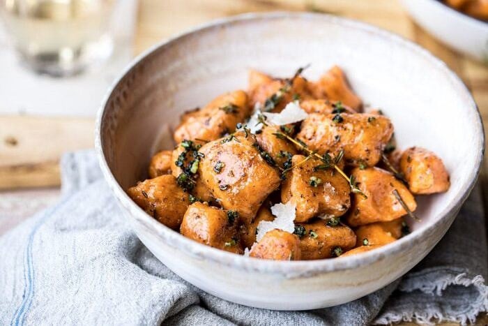 horizontal photo of Sweet Potato Gnocchi with Herbed White Wine Pan Sauce 
