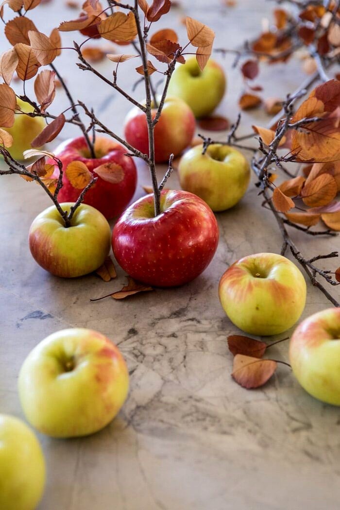 Sweet and Salty Chocolate Drizzled Cider Caramel Apples | halfbakedharvest.com #fallrecipes #apples #caramel #hallaween #thanksgiving raw apples before dipping