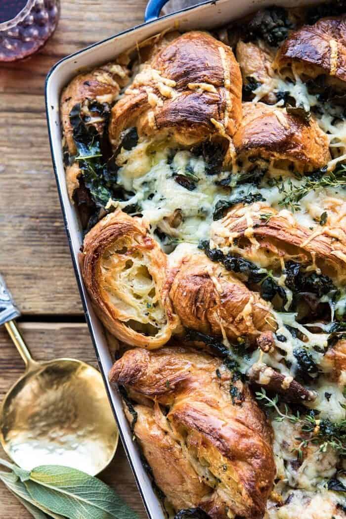 Herby Mushroom Croissant Stuffing | halfbakedharvest.com #stuffing #thanksgiving #easyrecipes #croissants overhead close up photo of Herby Mushroom Croissant Stuffing