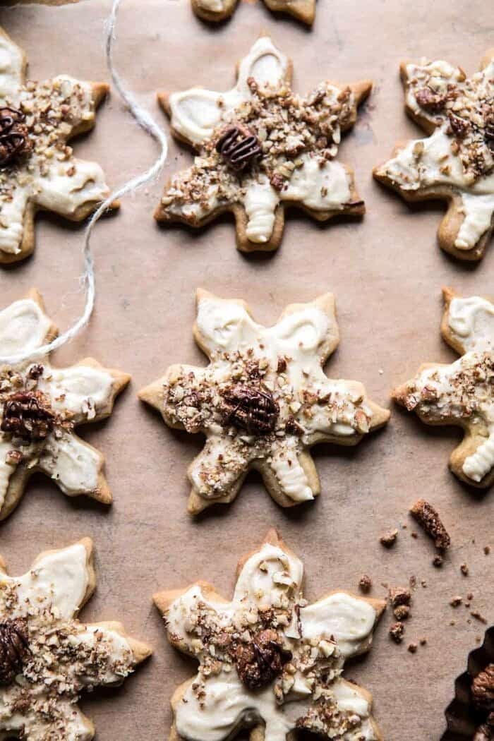 Pecan Pie Cookies with Butter Pecan Frosting | halfbakedharvest.com #cookies #thanksgiving #sugarcookies #pecans #holiday #chocolate