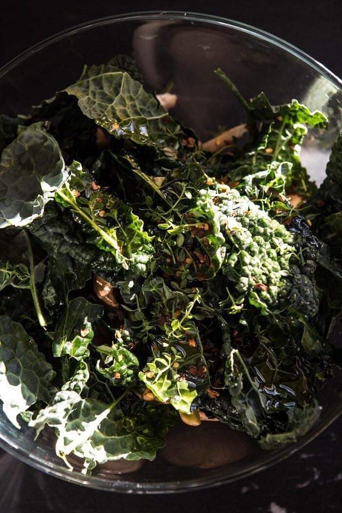 raw kale and mushrooms in bowl