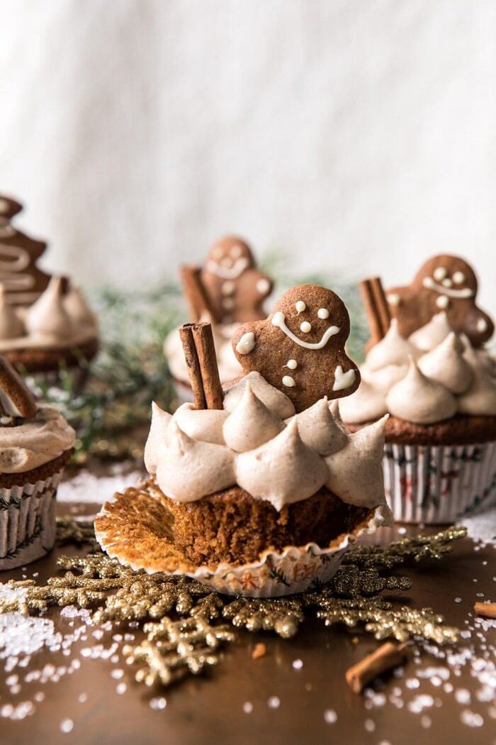 Gingerbread Cupcakes with Cinnamon Browned Butter Buttercream | halfbakedharvest.com #gingerbread #cupcakes #dessert #holiday #easyrecipes #christmas side angle photo of Gingerbread Cupcakes with Cinnamon Browned Butter Buttercream