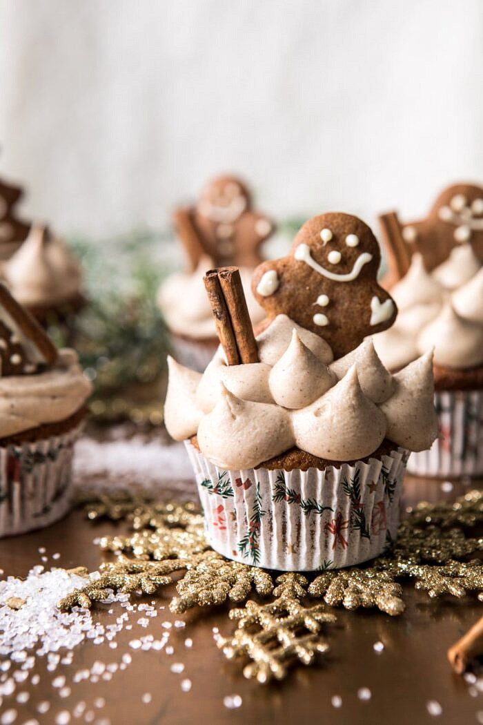 Gingerbread Cupcakes with Cinnamon Browned Butter Buttercream | halfbakedharvest.com #gingerbread #cupcakes #dessert #holiday #easyrecipes #christmas close up photo of Gingerbread Cupcakes with Cinnamon Browned Butter Buttercream