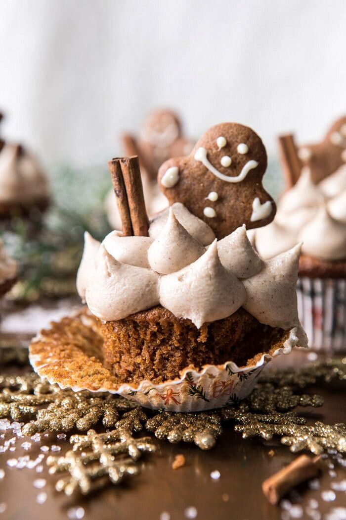Gingerbread Cupcakes with Cinnamon Browned Butter Buttercream | halfbakedharvest.com #gingerbread #cupcakes #dessert #holiday #easyrecipes #christmas close up photo of Gingerbread Cupcakes with Cinnamon Browned Butter Buttercream