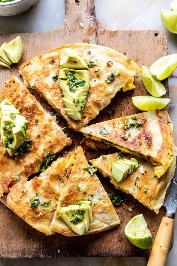 overhead close up photo of Breakfast Quesadilla with Soft Scrambled Eggs and Avocado Salsa 