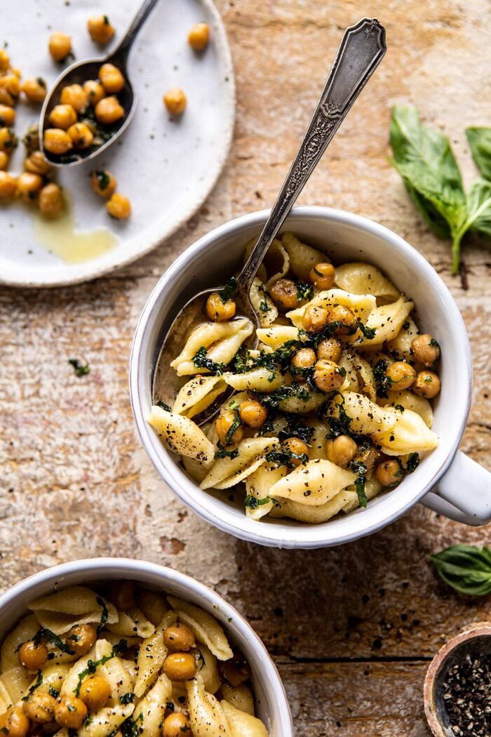 Instant Pot Cacio e Pepe with Crispy Garlic Basil Chickpeas | halfbakedharvest.com #pasta #instantpot #easyrecipes #healthyrecipes #chickpeas overhead photo of Instant Pot Cacio e Pepe with Crispy Garlic Basil Chickpeas with spoon in bowl