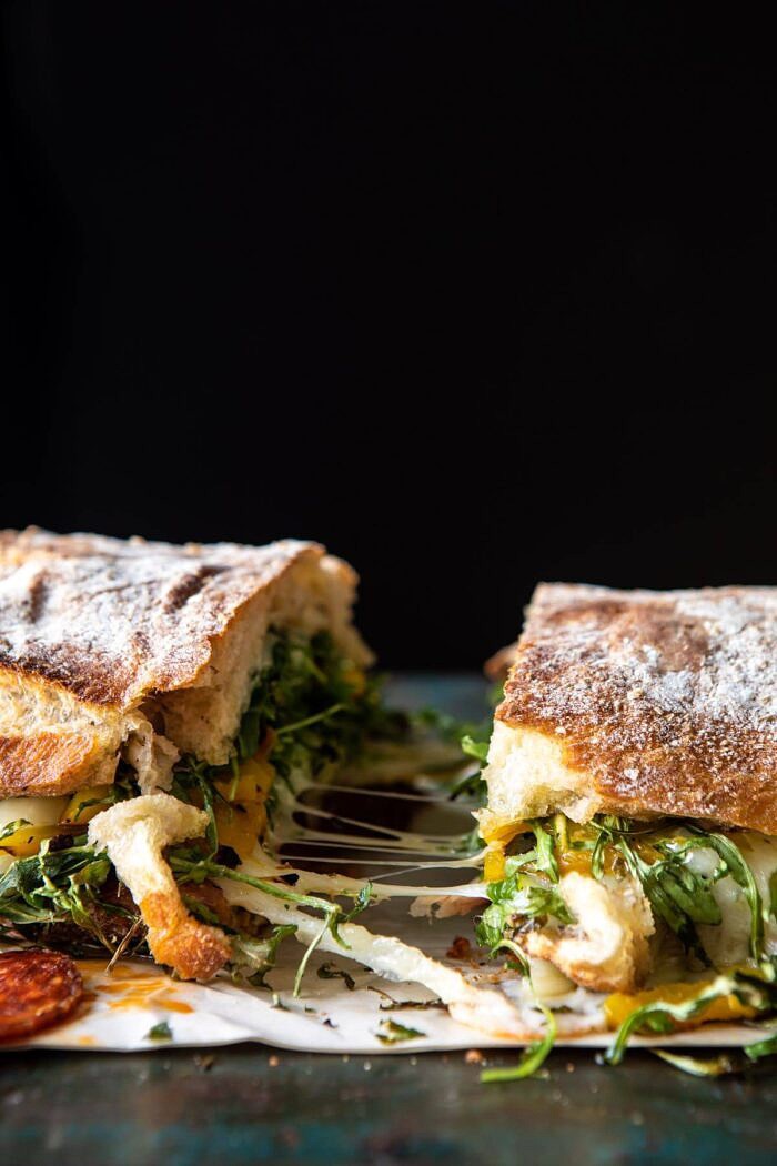 Party Size Italian Melt | halfbakedharvest.com #grilledcheese #easyrecipes #gameday side angled photo of Party Size Italian Melt being pulled apart
