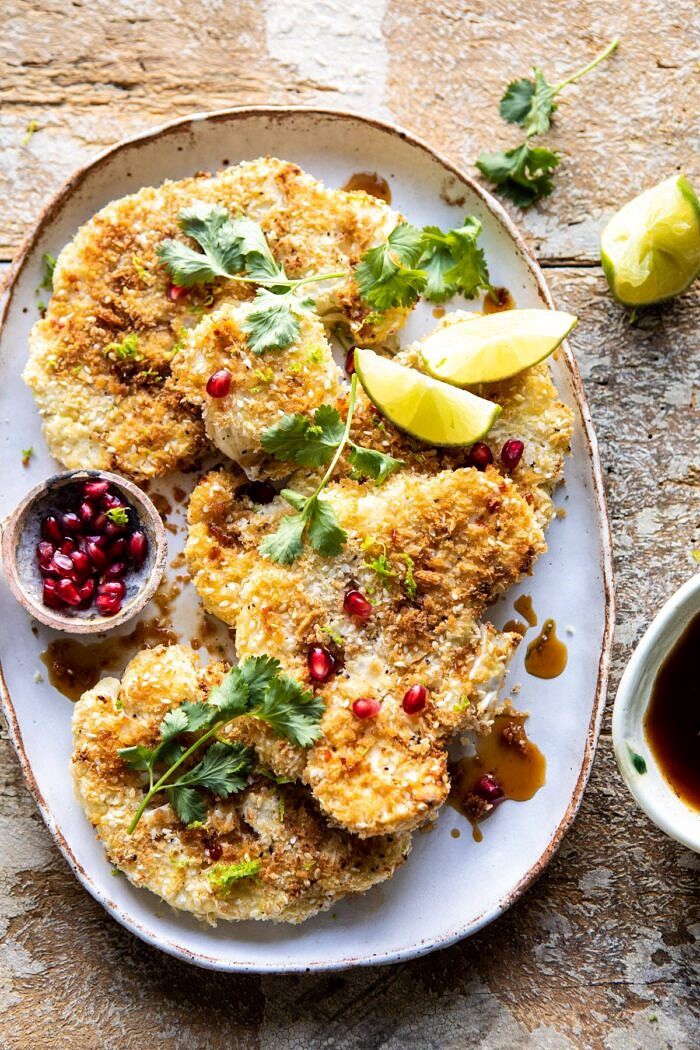 Sesame Crusted Cauliflower with Pomegranate Ponzu Sauce | halfbakedharvest.com #cauliflower #healthyrecipes #easyrecipes #vegetarian overhead photo of Sesame Crusted Cauliflower with Pomegranate Ponzu Sauce