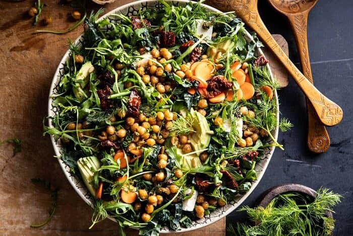 horizontal photo of Super Green Sun-Dried Tomato Herb Salad with Crispy Chickpeas