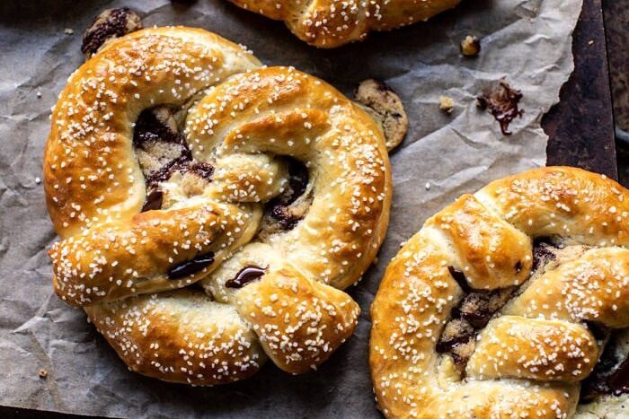 Chocolate Chip Cookie Stuffed Soft Pretzels | halfbakedharvest.com #pretzels #cookies #chocolatechipcookies #dessert #superbowl horizontal photo of Chocolate Chip Cookie Stuffed Soft Pretzels