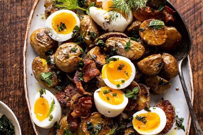 Crispy Breakfast Potatoes with Chili Garlic Oil and Herbs | halfbakedharvest.com #potatoes #breakfast #easyrecipes #brunch horizontal photo of Crispy Breakfast Potatoes with Chili Garlic Oil and Herbs