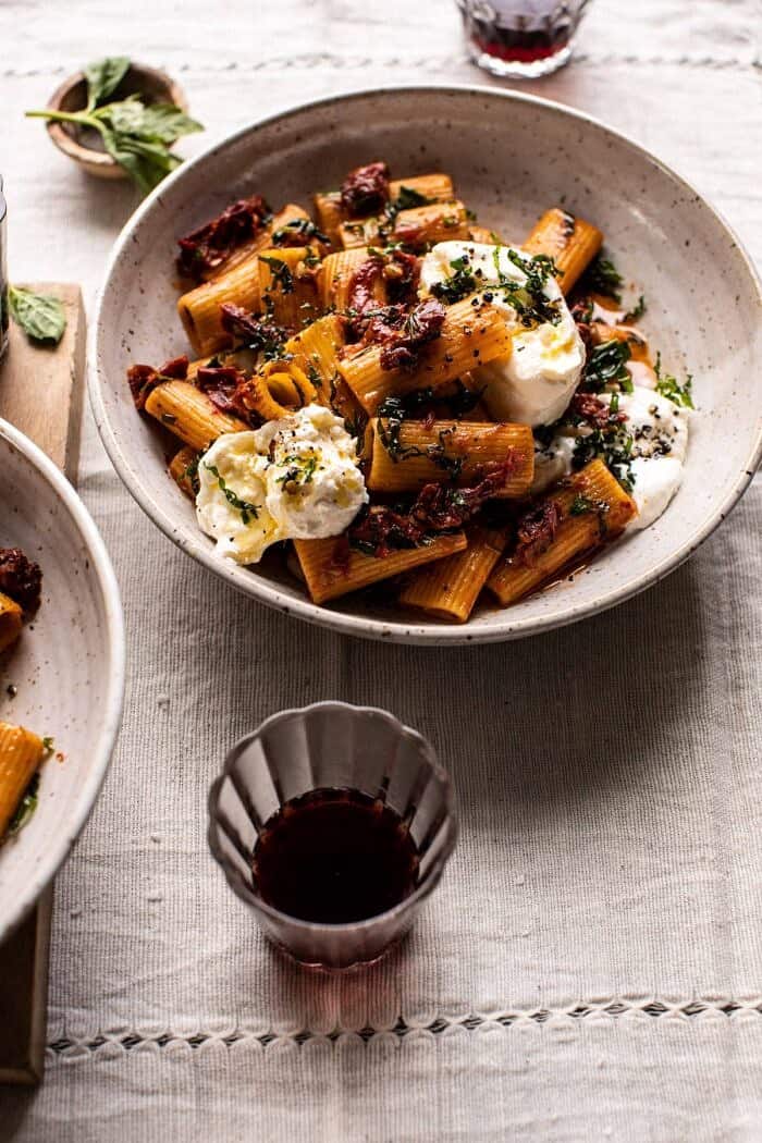 Quick Pantry Pasta with Sun-Dried Tomatoes and Burrata | halfbakedharvest.com #pasta #pantrypasta #easyrecipes #Italian #dinner side angled photo of Quick Pantry Pasta with Sun-Dried Tomatoes and Burrata