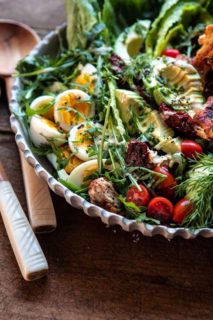side angled photo of Sun-Dried Tomato Chicken and Avocado Cobb Salad with Tahini Ranch
