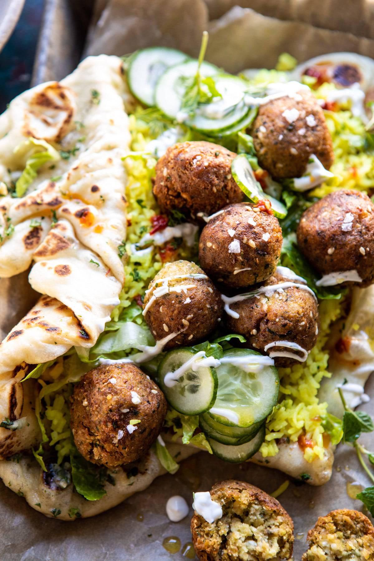Falafel Naan Wraps with Golden Rice and Special Sauce | halfbakedharvest.com #falafel #wraps #middleeastern #vegan
