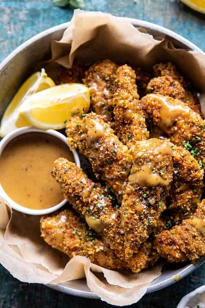 Baked Black Pepper Ranch Chicken Fingers with Honey Mustard | halfbakedharvest.com #chicken #easyrecipes #dinner #chickenfingers