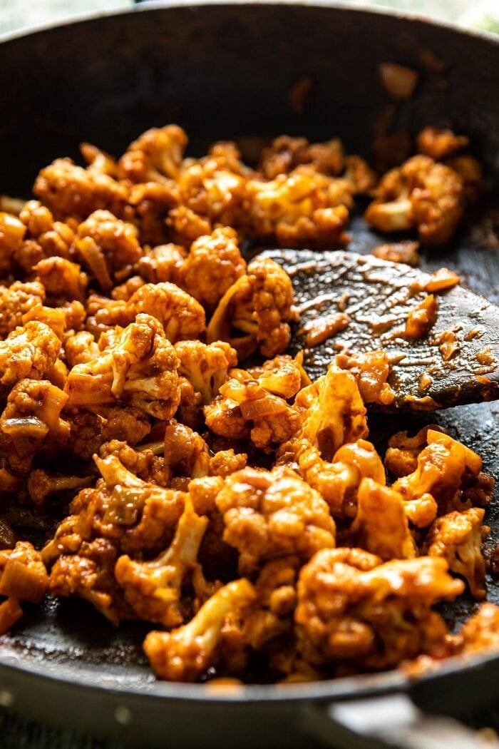 Cauliflower Al Pastor Quesadillas with Lime Smashed Avocado | halfbakedharvest.com #vegan #Mexican #cauliflower #pineapple #sandwich #easyrecipes #cheese side angled photo Cauliflower Al Pastor in skillet