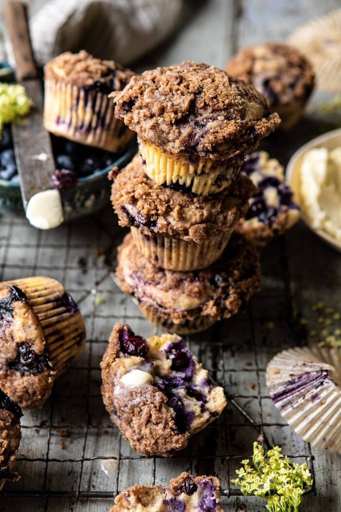 Blueberry Swirl Coffee Cake Muffins stacked on top of each other