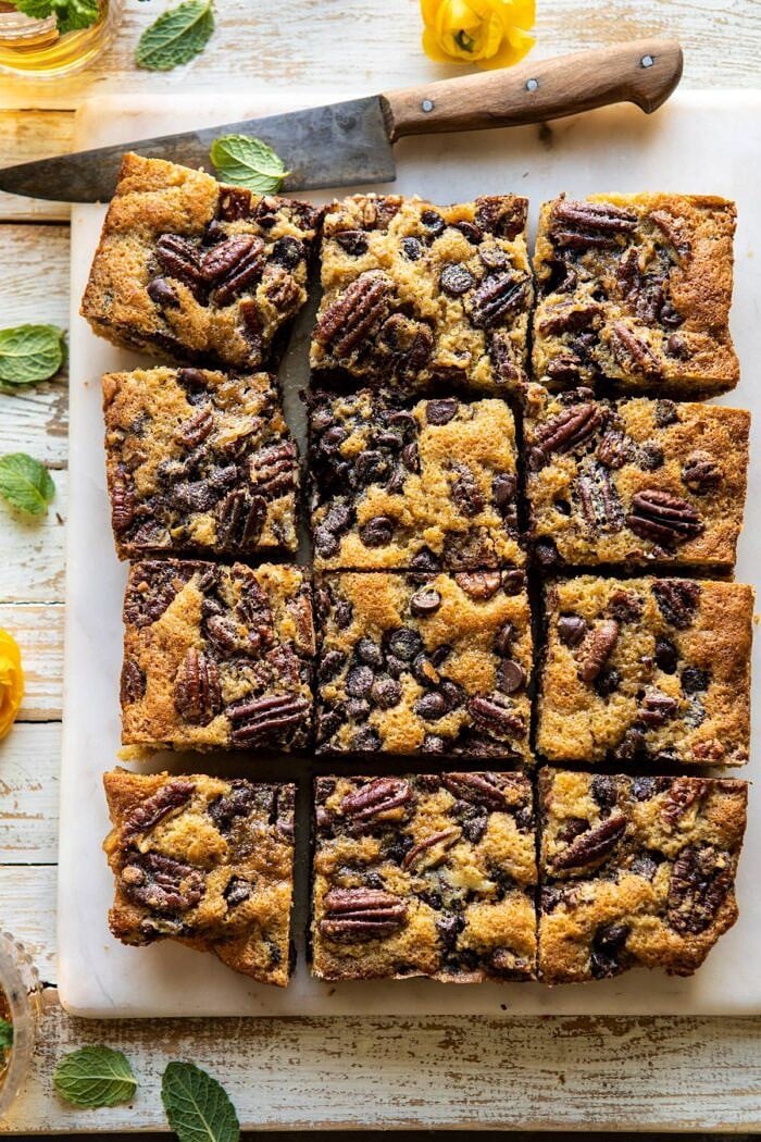 Kentucky Derby Pie Chocolate Chip Cookie Bars | halfbakedharvest.com #cookiebars #pecanpie #chocolatechip #dessert overhead photo of Kentucky Derby Pie Chocolate Chip Cookie Bars