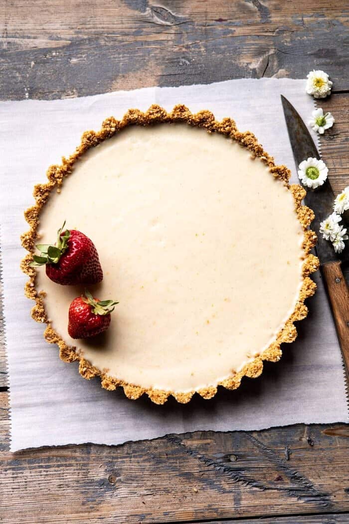 No Fuss Lemon Tart | halfbakedharvest.com #lemontart #dessert #summer #nobake #easyrecipes overhead photo of No Fuss Lemon Tart without berries on top