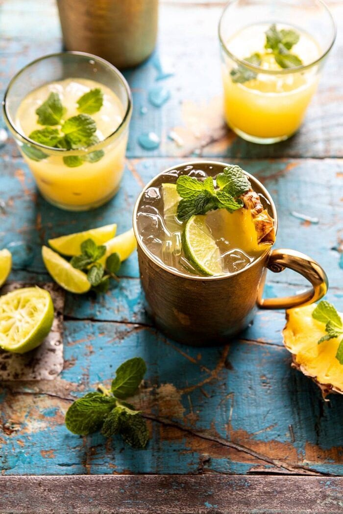 Orange Pineapple Moscow Mule | halfbakedharvest.com #cocktails #drinks #vodka overhead photo of Orange Pineapple Moscow Mule