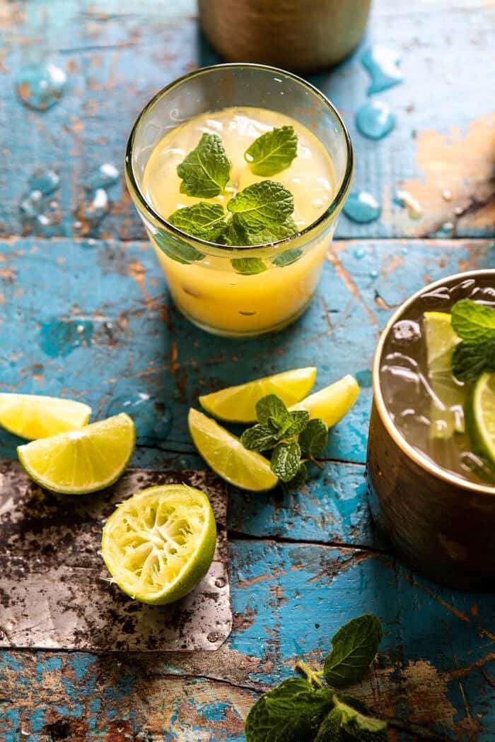 Orange Pineapple Moscow Mule | halfbakedharvest.com #cocktails #drinks #vodka overhead photo of Orange Pineapple Moscow Mule in glass
