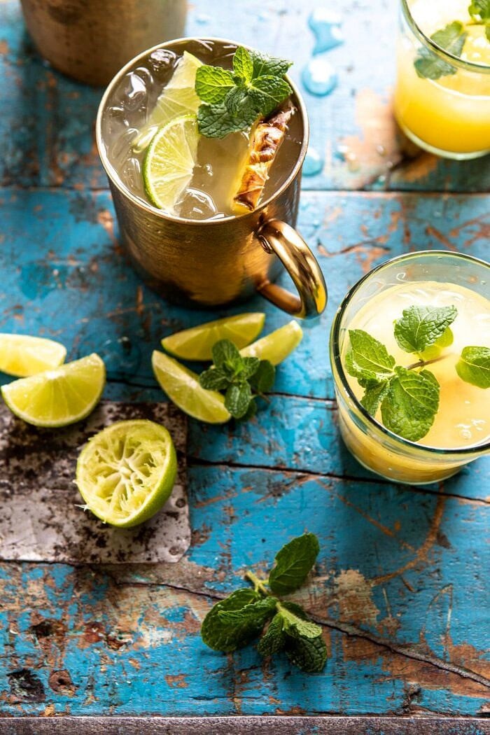 Orange Pineapple Moscow Mule | halfbakedharvest.com #cocktails #drinks #vodka overhead photo of Orange Pineapple Moscow Mule