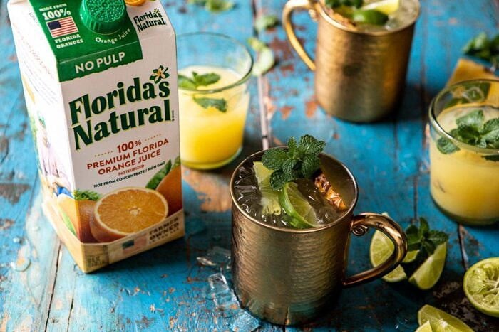 Orange Pineapple Moscow Mule | halfbakedharvest.com #cocktails #drinks #vodka horizontal photo of Orange Pineapple Moscow Mule