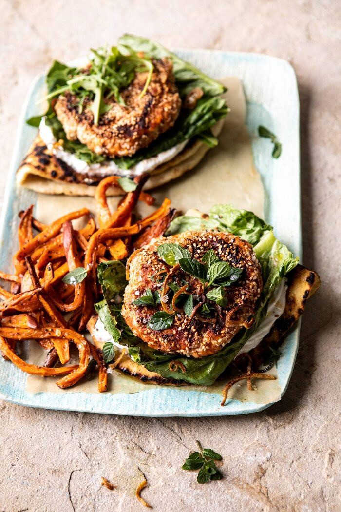 Sesame Crusted Curried Salmon Burgers with Lemony Herbs | halfbakedharvest.com #salmon #healthy #burger #summer overhead photo of Sesame Crusted Curried Salmon Burgers with Lemony Herbs