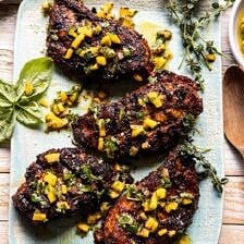 Tropical Jerk Grilled Chicken with Charred Mango Salsa Verde | halfbakedharvest.com #chicken #grilled #easyrecipe #healthy