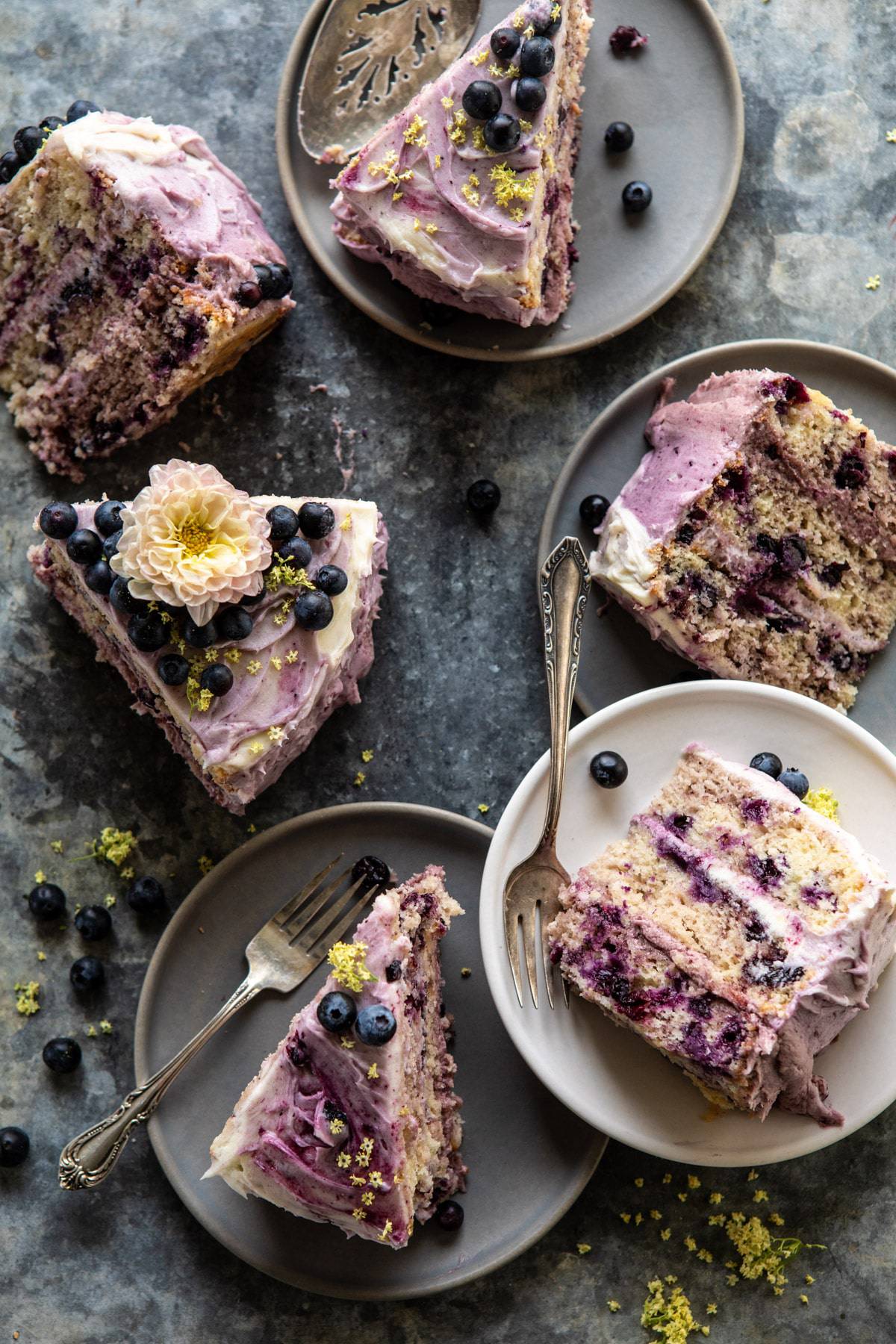 Bursting Blueberry Lemon Layer Cake | halfbakedharvest.com #bleberrycake #layercake #summerrecipes #dessert