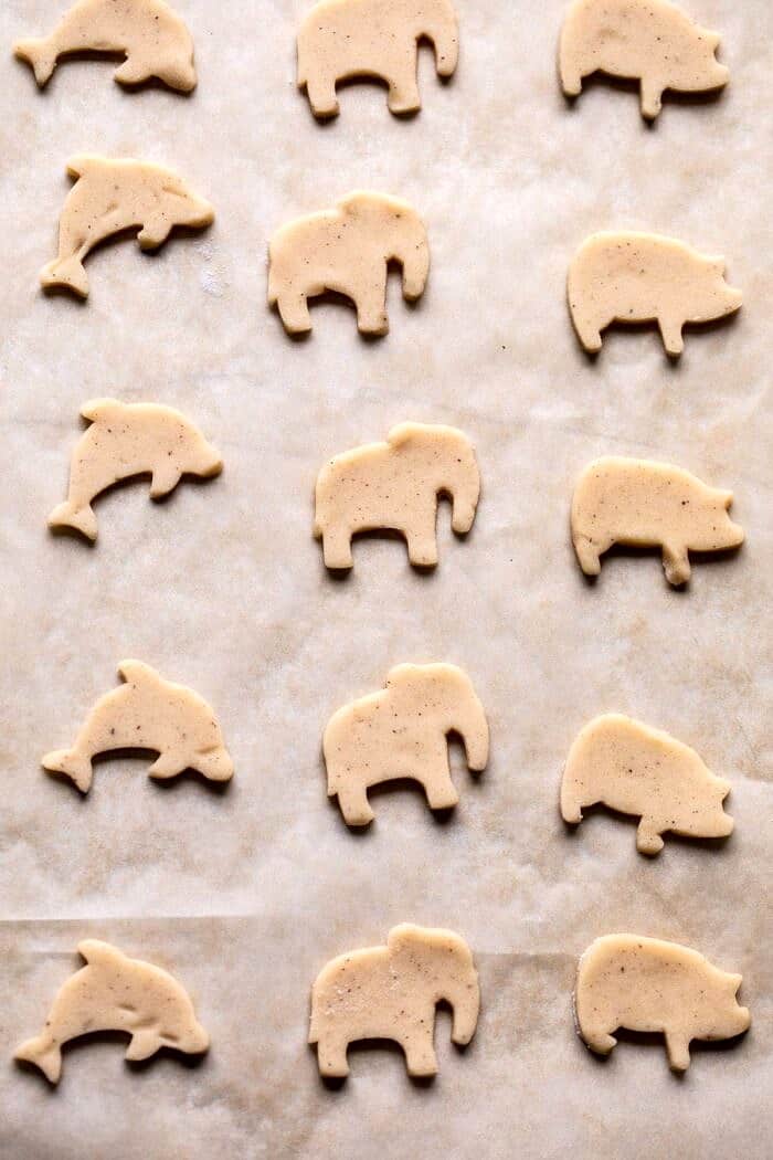 Homemade Animal Crackers | halfbakedharvest.com #crackers #homemaderecipes #cookies #snacks Homemade Animal Cracker on baking sheet before baking
