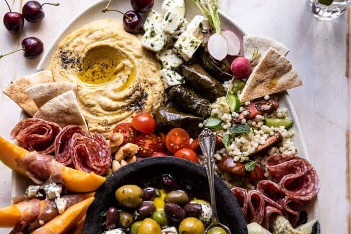 No Fuss Farmers Market Mezze Platter | halfbakedharvest.com #appetizer #easyrecipes #healthy #summer #4thofjuly horizontal close up photo of No Fuss Farmers Market Mezze Platter