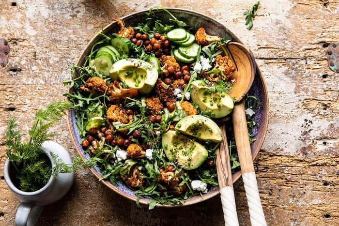 Roasted Cauliflower Salad with Creamy Honey Mustard Vinaigrette | halfbakedharvest.com #healthyrecipes #salad #cauliflower horizontal photo of Roasted Cauliflower Salad with Creamy Honey Mustard Vinaigrette