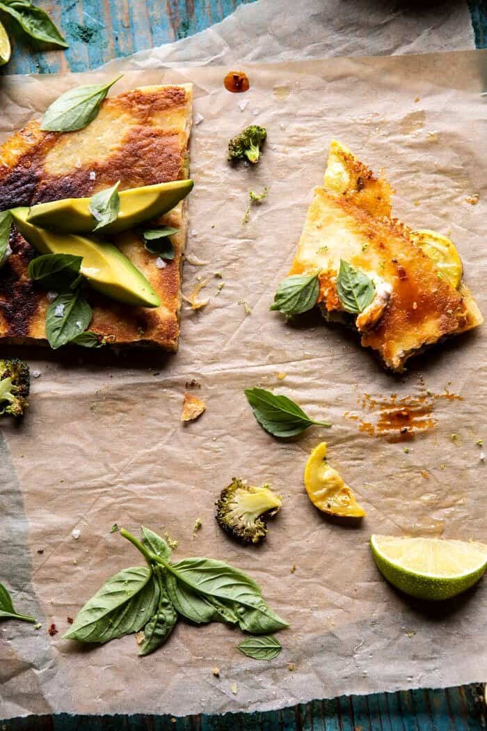 Broccoli Cheese Quesadilla with Chipotle Sesame Sauce | halfbakedharvest.com #quesadilla #easyrecipes #broccoli #mexican overhead photo of Broccoli Cheese Quesadilla with most of the quesadilla eaten and removed from photo