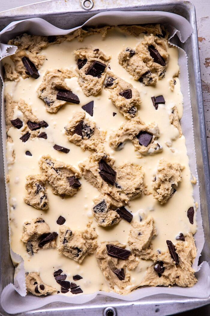 overhead photo of Crème Fraîche Chocolate Chunk Cookie Bars in baking dish before baking