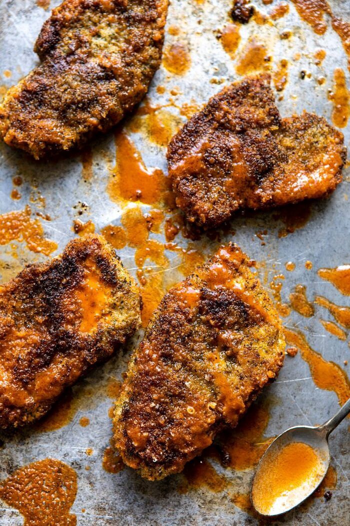 Crispy Buffalo Ranch Chicken Salad with Goddess Dressing | halfbakedharvest.com #buffalochicken #salad #healthy #dinner overhead photo of Crispy Buffalo Ranch Chicken on baking sheet