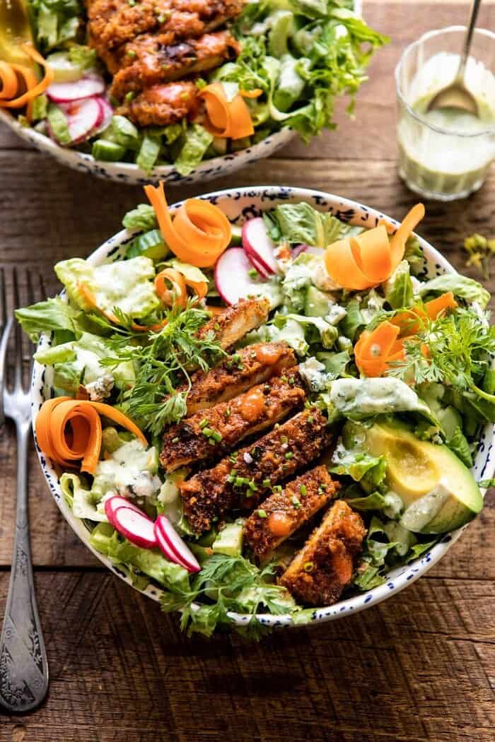Crispy Buffalo Ranch Chicken Salad with Goddess Dressing | halfbakedharvest.com #buffalochicken #salad #healthy #dinner side angled photo of Crispy Buffalo Ranch Chicken Salad with Goddess Dressing