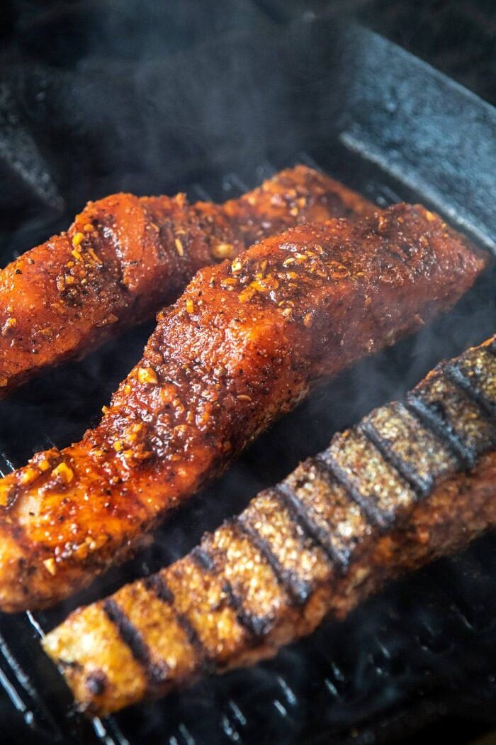 Lemon Parmesan Salmon with Corn, Tomato, and Avocado Salad | halfbakedharvest.com #salmon #grillingrecipes #dinner salmon on grill