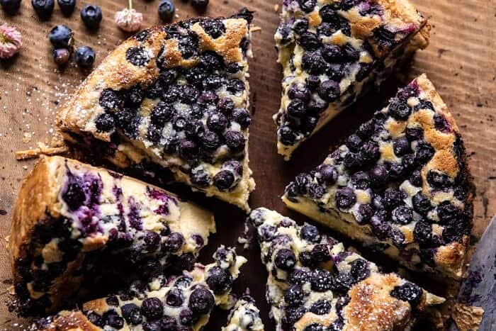 Simple Blueberry Basque Cheesecake | halfbakedharvest.com #cheesecake #blueberries #cake #easyrecipes horizontal photo of Simple Blueberry Basque Cheesecake
