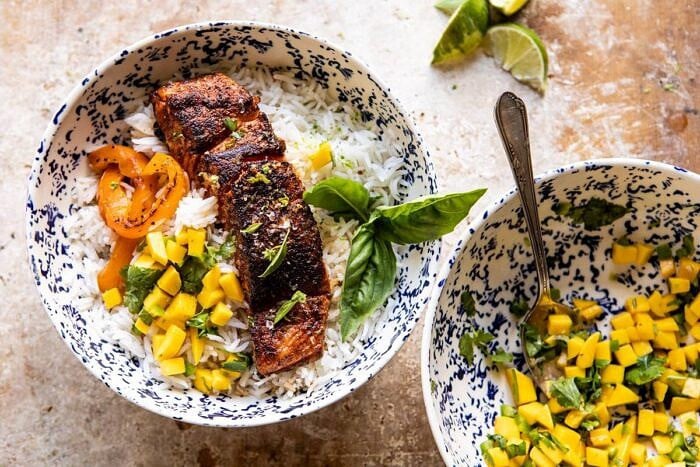 Cilantro Lime Salmon with Mango Salsa | halfbakedharvest.com #salmon #easyrecipes #healthyrecipes #dinner overhead photo Cilantro Lime Salmon with Mango Salsa in bowls of rice