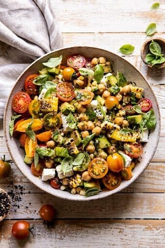 Corn, Tomato, and Avocado Chickpea Salad | halfbakedharvest.com #healthy #tomatosalad #quick #mealprep