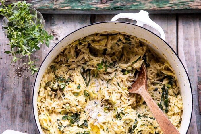 horizontal photo of Souper Creamy Lemon Butter Cheesy Zucchini Orzo 