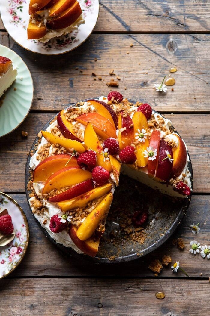 overhead photo of Peaches and Cream Pretzel Pie with 2 slices of pie removed from pie plate