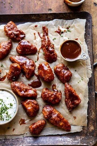 Baked Boneless Honey BBQ Chicken Wings with Spicy Ranch | halfbakedharvest.com #chicken #footballfood #bakedrecipes